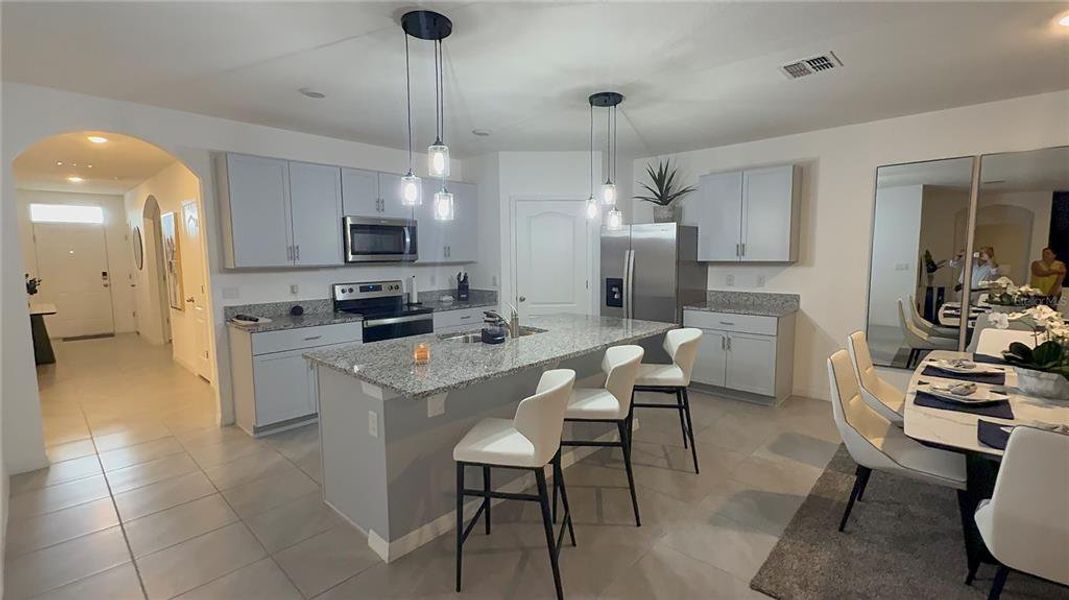 Furnished interior view inside a new home in , Kissimmee (Image 7).