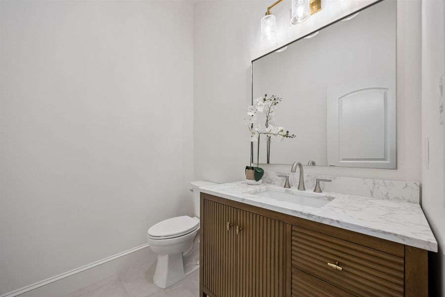 Half powder bath on first floor for guests