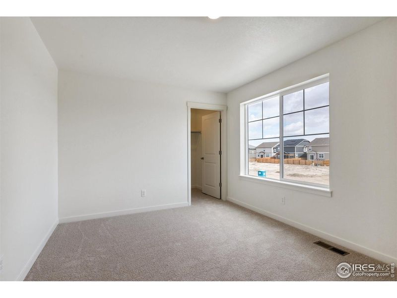 Spacious, unfurnished interior of a new home in Ridge at Johnstown, Johnstown (Image 19).