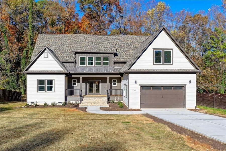 Front exterior of a new home in , Sugar Hill, GA, highlighting curb appeal (Image 26). Front exterior of a new home in , Sugar Hill, GA, highlighting curb appeal (Image 26).