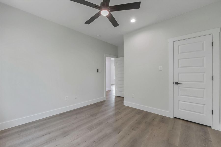 The third bedroom features a closet and a bright, comfortable layout with a clean, modern finish. The third bedroom features a closet and a bright, comfortable layout with a clean, modern finish.