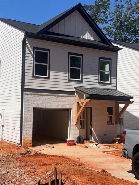 Front exterior of a new home in , Cleveland, GA, highlighting curb appeal (Image 22).