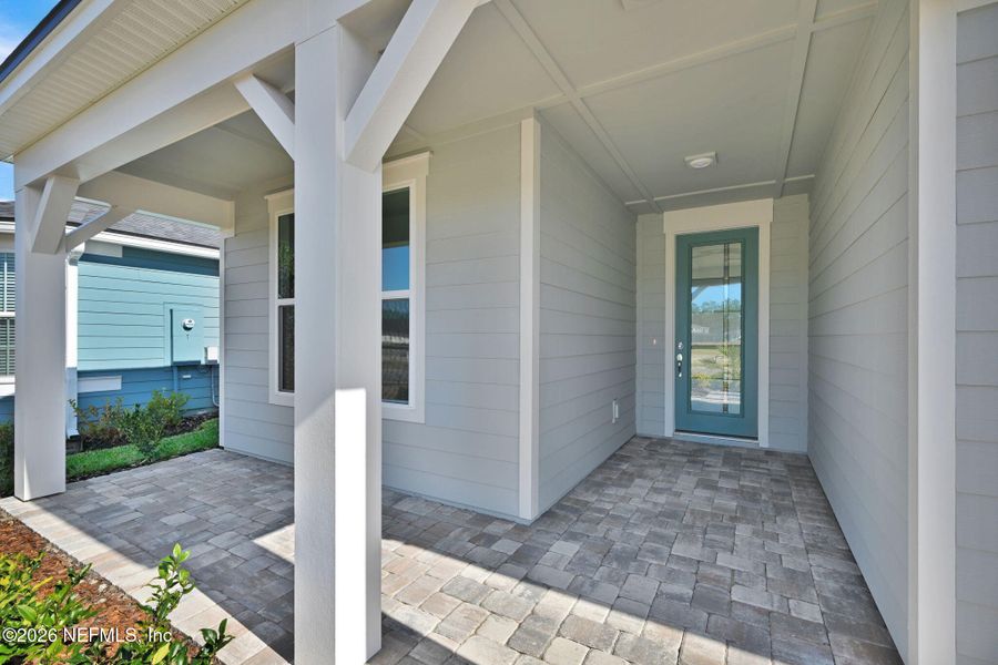 Exterior details and patio area of a home in Del Webb Wildlight, Yulee (Image 19).