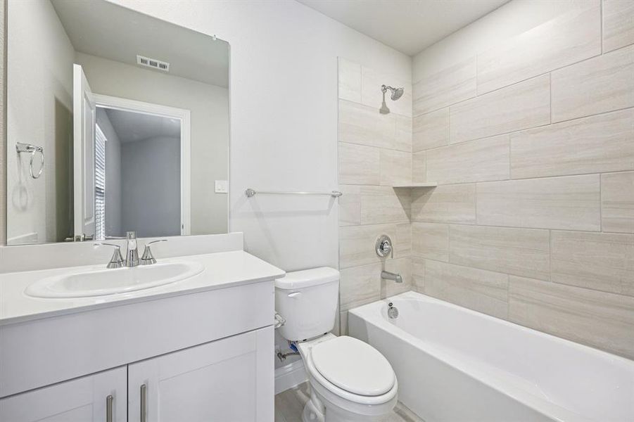 Photo is not of the actual home, but is an inspirational photo of builder’s model home and may depict options, furnishings, and/or decorator features that are not included.