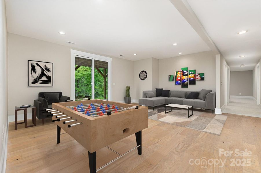 Lower Level Rec Room with walkout patio (staged)