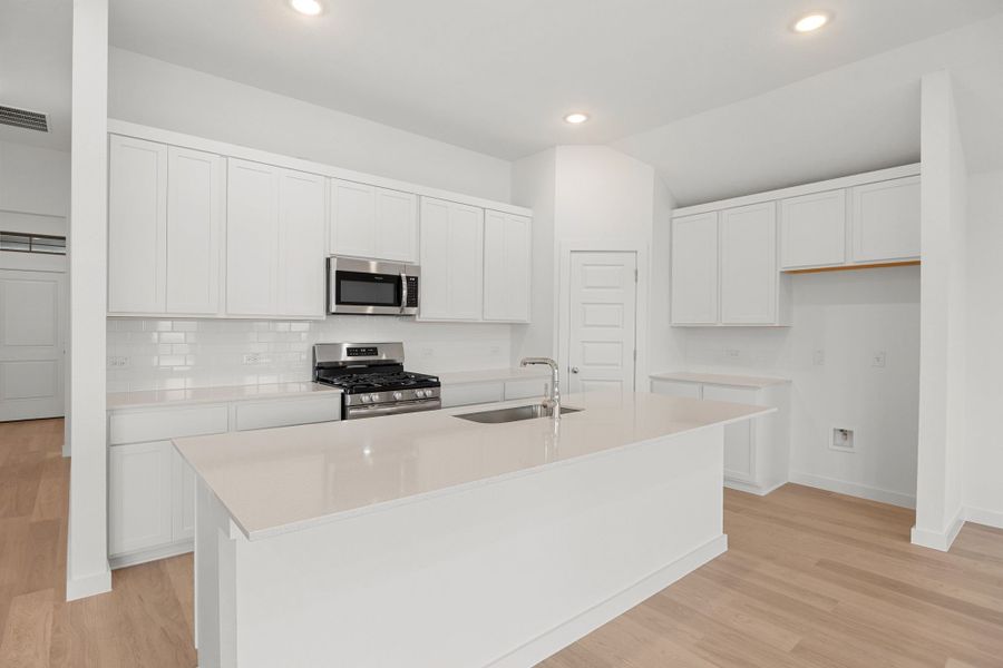 Representative furnished interior of a home built from the Brazos | Prairie Winds by Trophy Signature Homes in Prairie Winds, Hutto (Image 5).