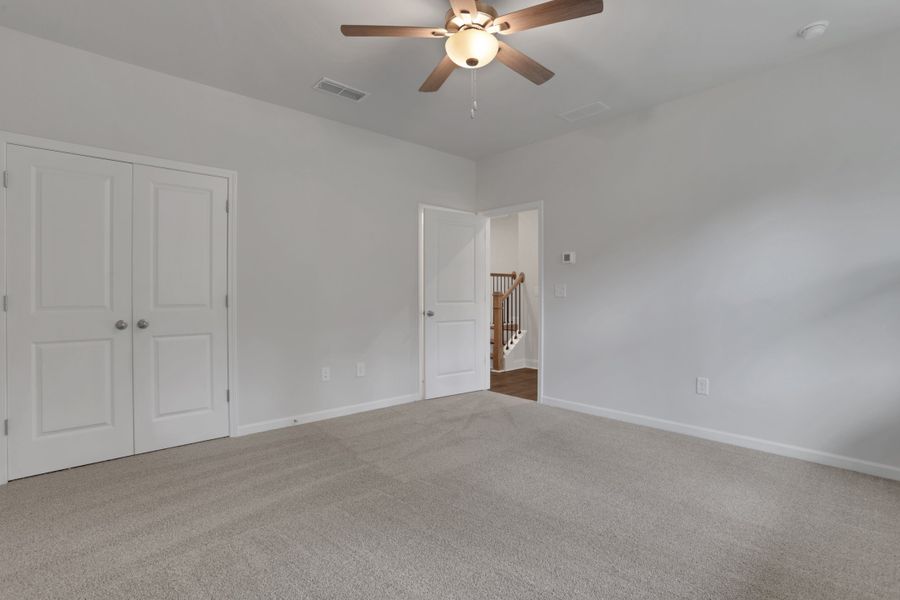 Spacious, unfurnished interior of a new home in Towne Village at Suwanee Dam, Sugar Hill (Image 23).