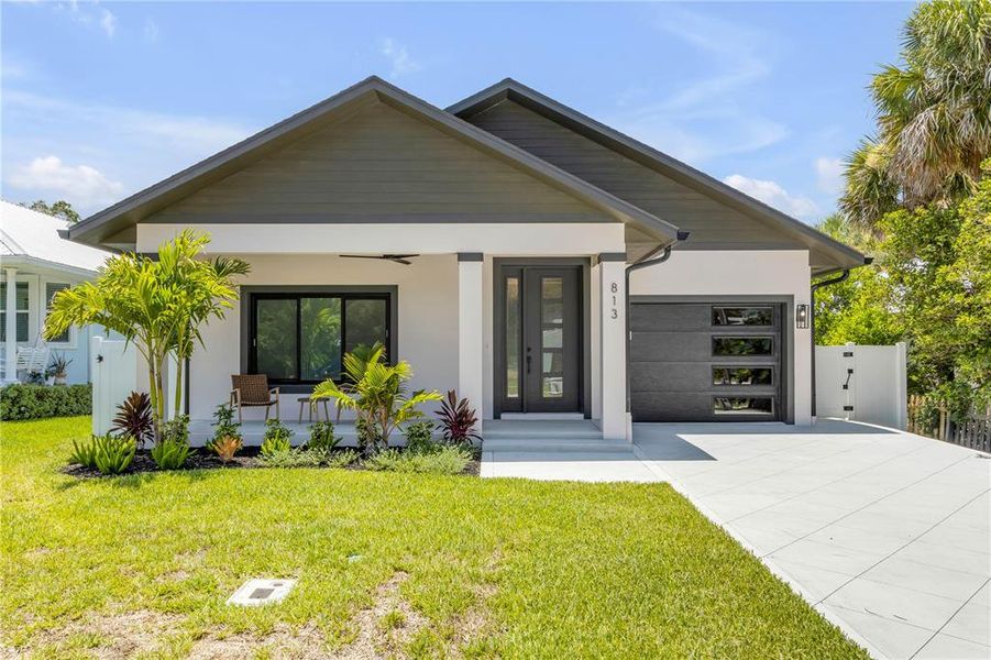 Front exterior of a new home in , New Smyrna Beach, FL, highlighting curb appeal (Image 28). Front exterior of a new home in , New Smyrna Beach, FL, highlighting curb appeal (Image 28).