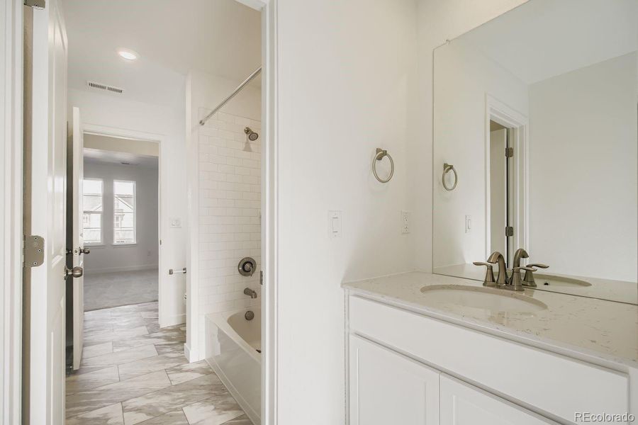Furnished interior view inside a new home in Ken-Caryl Ranch, Littleton (Image 5).