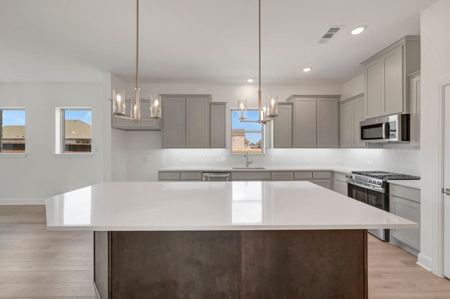 Furnished interior view inside a new home in Creekshaw – Classic, Royse City (Image 6).
