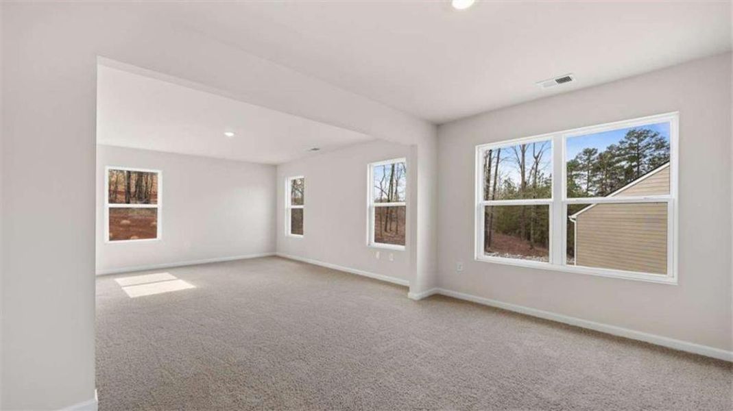 Spacious, unfurnished interior of a new home in Brooks Station, Dacula (Image 24).