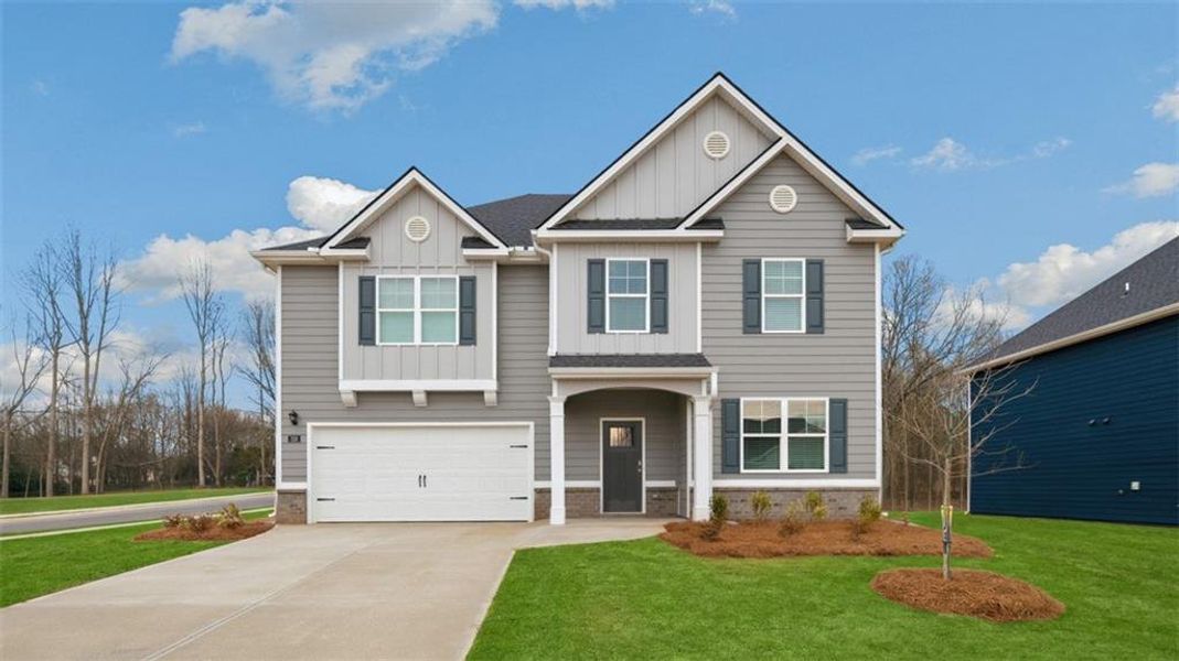 Front exterior of a new home in Jackson Landing, Jefferson, GA, highlighting curb appeal (Image 2). Front exterior of a new home in Jackson Landing, Jefferson, GA, highlighting curb appeal (Image 2).