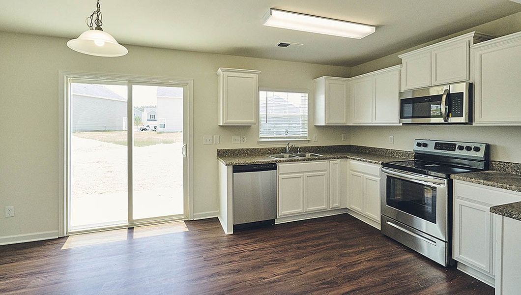 Representative furnished interior of a home built from the Rachel by D.R. Horton in Fishel Village, Winston-Salem (Image 6). Representative furnished interior of a home built from the Rachel by D.R. Horton in Fishel Village, Winston-Salem (Image 6).