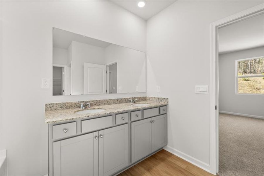 Furnished interior view inside a new home in Northwoods at Mirror Lake, Villa Rica (Image 8).