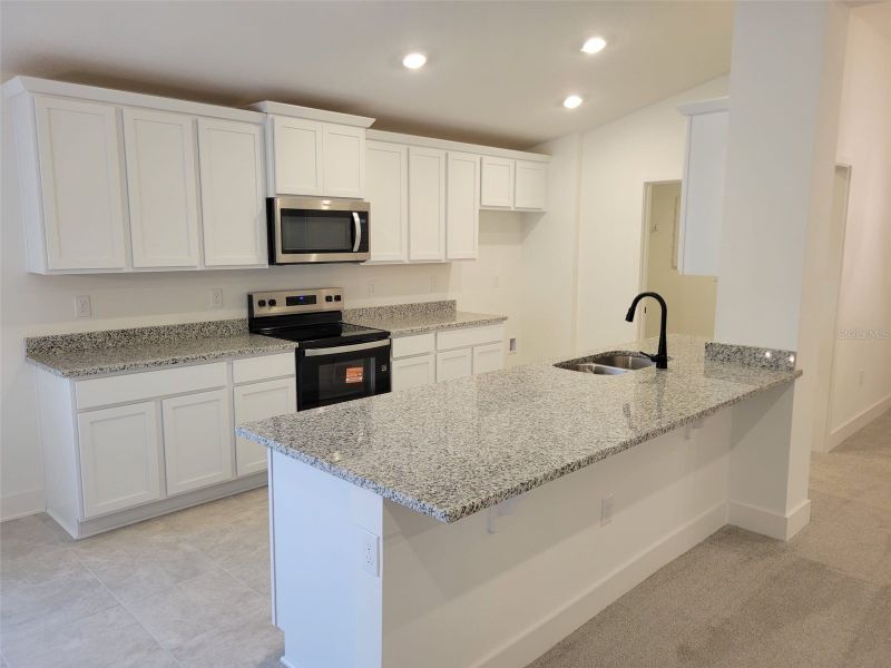 Furnished interior view inside a new home in Arbor Park, Leesburg (Image 3).
