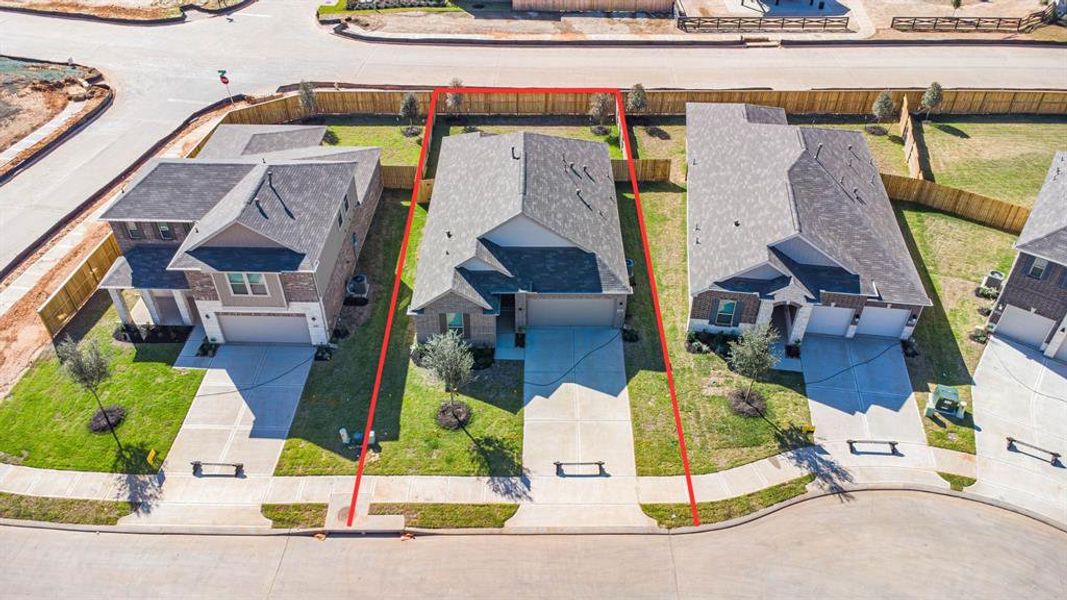 Amazing aerial shot of this gorgeous KB Home home situated on a large lot with NO REAR NEIGHBORS. Featuring lush landscaping, well manicured front lawn and a wonderful back.