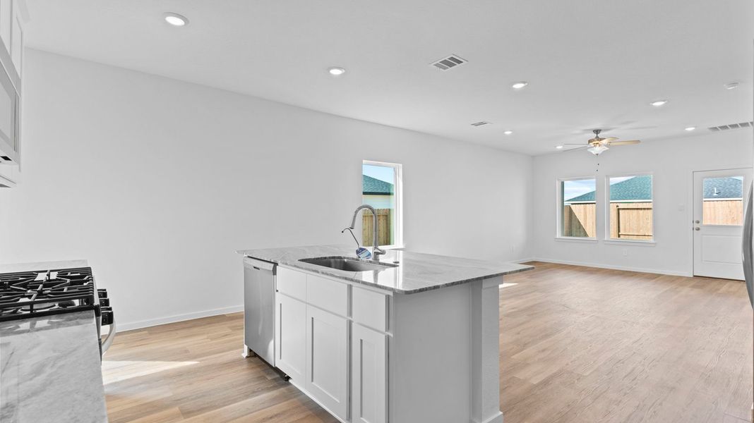 Representative furnished interior of a home built from the Hanna by D.R. Horton in Caldwell Crossing, Iowa Colony (Image 6).