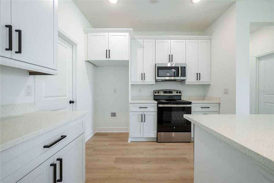 Furnished interior view inside a new home in , North Port (Image 6).