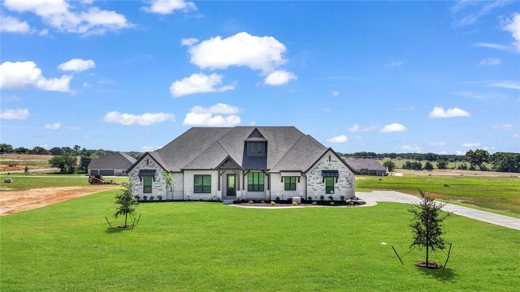 Front exterior of a new home in , Decatur, TX, highlighting curb appeal (Image 27).