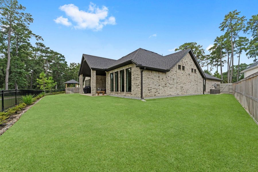 Exterior details and patio area of a home in Audubon Park 70', Magnolia (Image 4). Exterior details and patio area of a home in Audubon Park 70', Magnolia (Image 4).