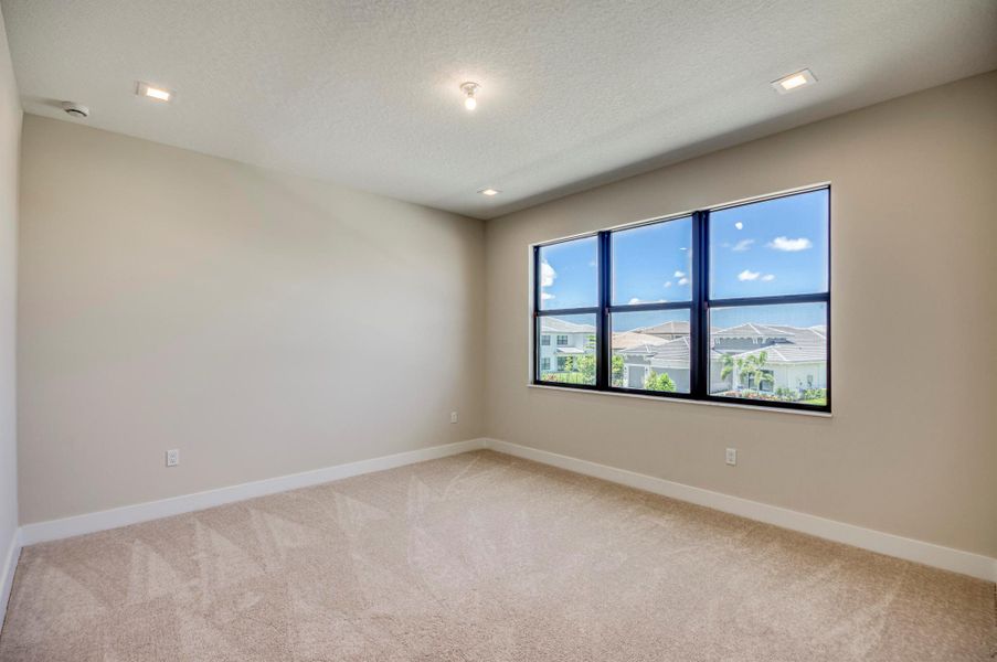 Furnished interior view inside a new home in Apex at Avenir, Palm Beach Gardens (Image 37).