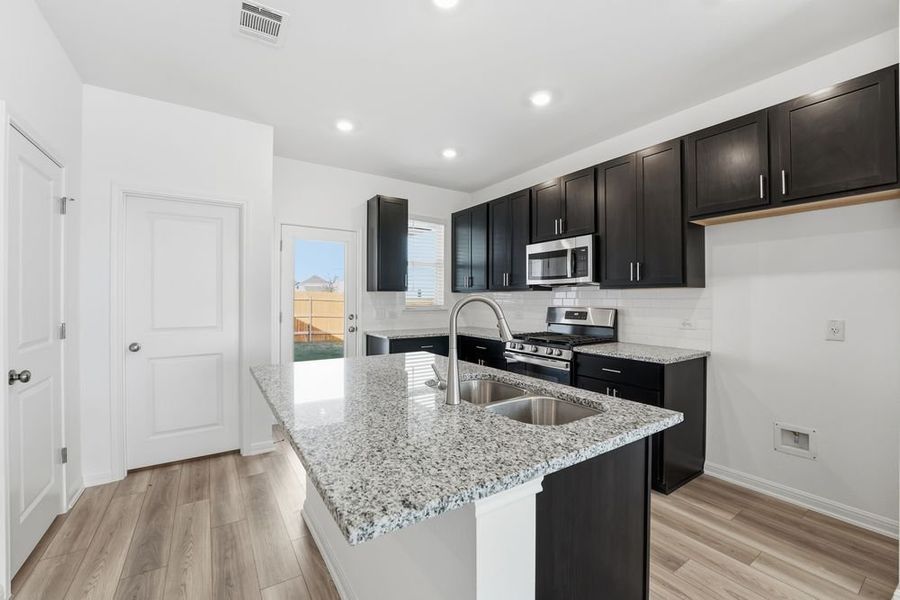 Furnished interior view inside a new home in Longview, Del Valle (Image 5).