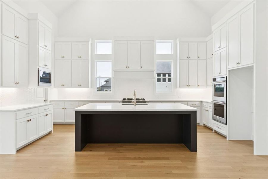 The oversized island is the ideal place for friends and family to gather round! The oversized island is the ideal place for friends and family to gather round!