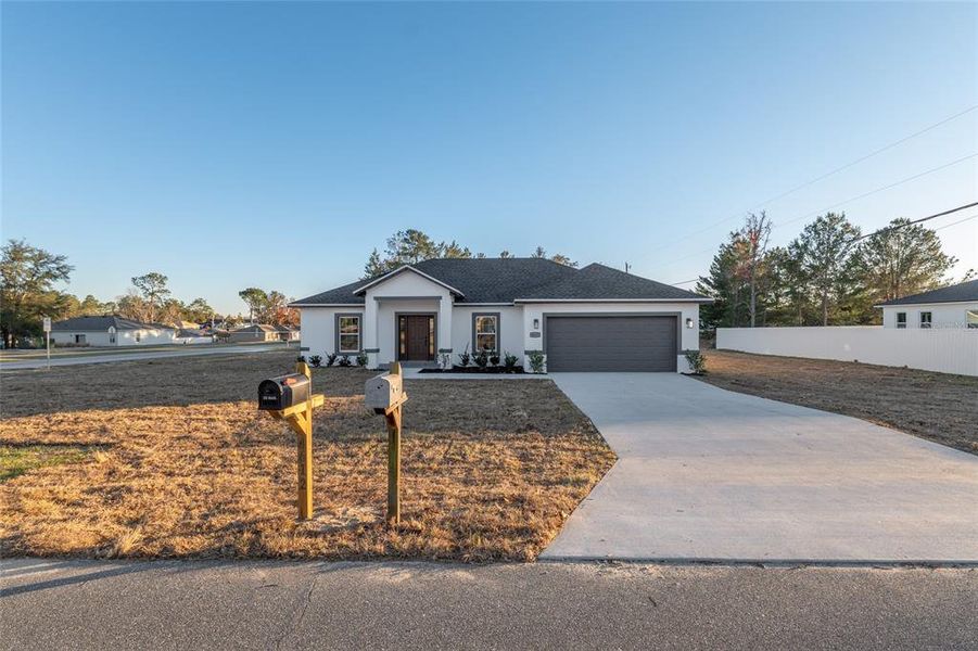 Front exterior of a new home in , Ocala, FL, highlighting curb appeal (Image 29).