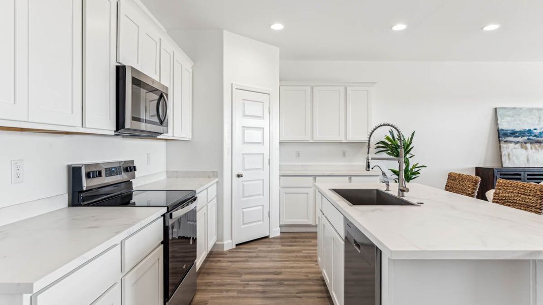 Representative furnished interior of a home built from the Eureka by D.R. Horton in Magma Ranch Vistas, Florence (Image 6). Representative furnished interior of a home built from the Eureka by D.R. Horton in Magma Ranch Vistas, Florence (Image 6).