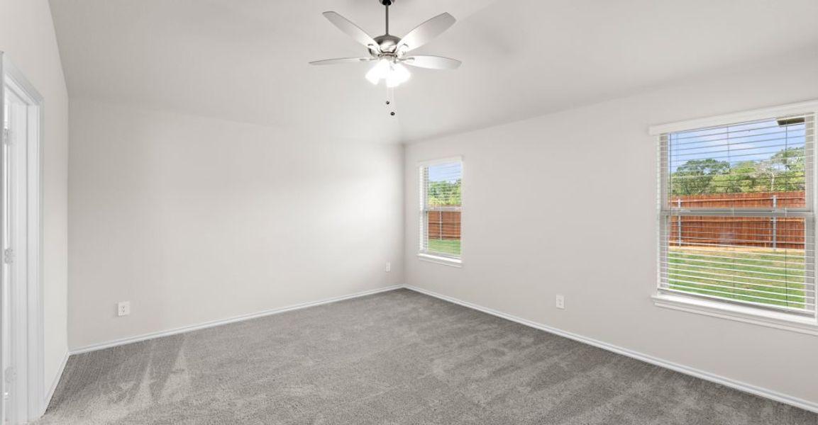 Representative exterior photo of a completed home built from the Austin by Impression Homes in Keeneland, Aubrey, TX (Image 13).