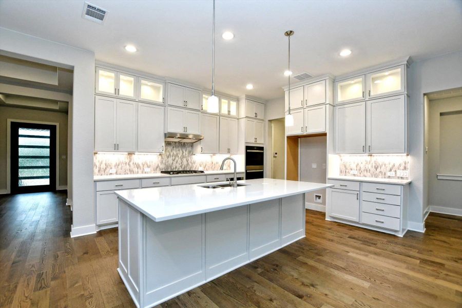 Furnished interior view inside a new home in The Hollows on Lake Travis, Leander (Image 15).