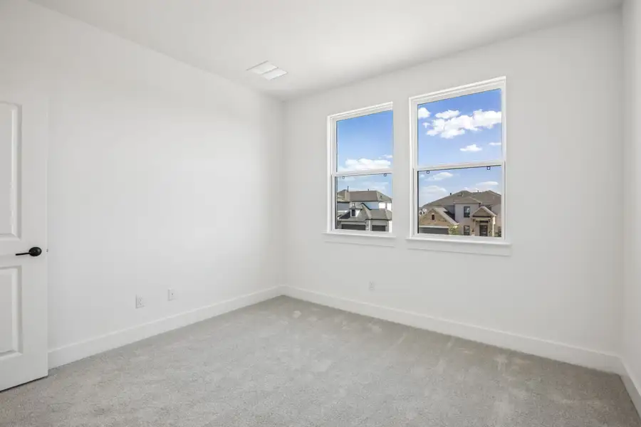 Representative unfurnished interior of a home built from the Anderson by Taylor Morrison in Easton Park, Austin (Image 41).