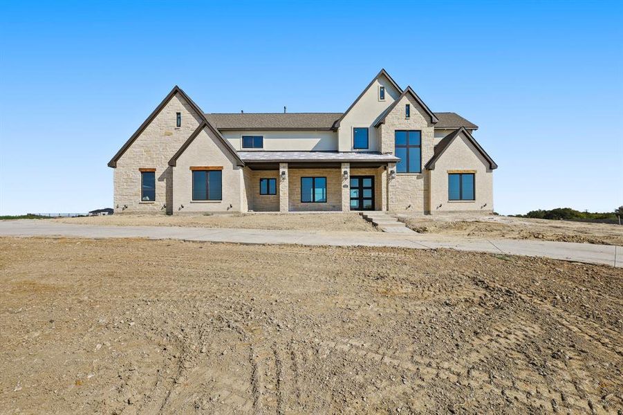 Front exterior of a home in the Harper Estates community, located in Celina, TX (Image 10).