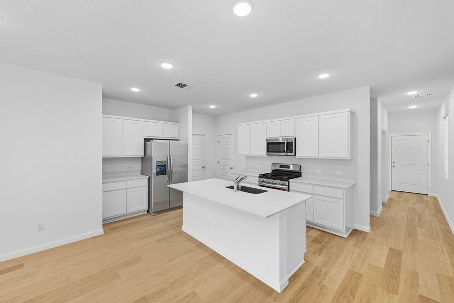 Furnished interior view inside a new home in Trinity Ranch, Elgin (Image 7). Furnished interior view inside a new home in Trinity Ranch, Elgin (Image 7).