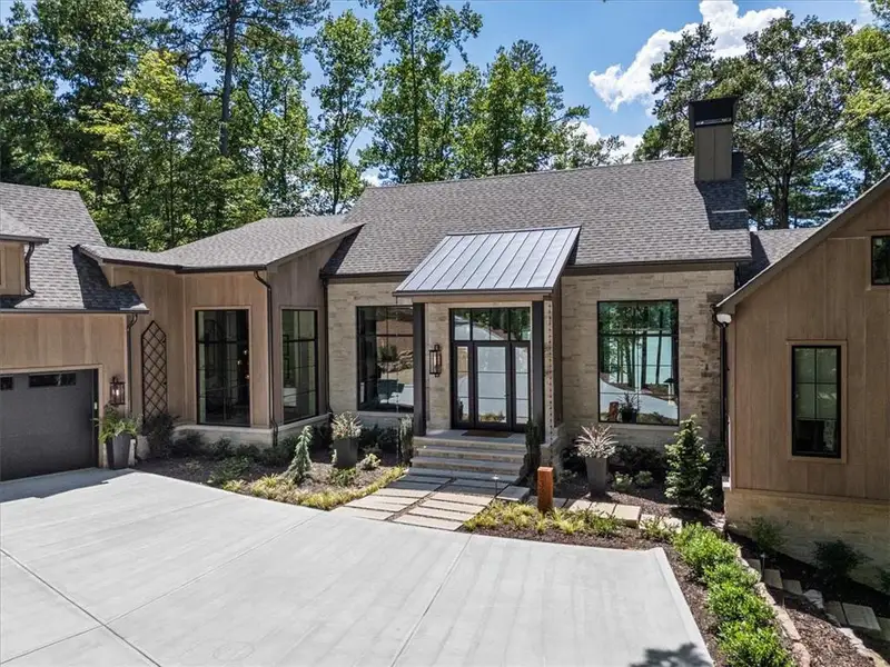 Front exterior of a new home in , Gainesville, GA, highlighting curb appeal (Image 1). Front exterior of a new home in , Gainesville, GA, highlighting curb appeal (Image 1).