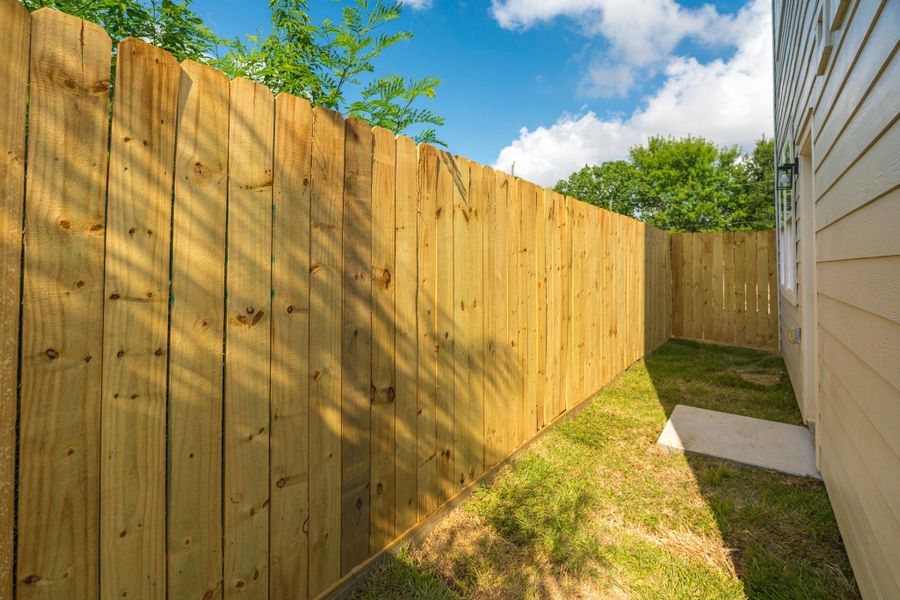 Exterior details and patio area of a home in , Houston (Image 19). Exterior details and patio area of a home in , Houston (Image 19).