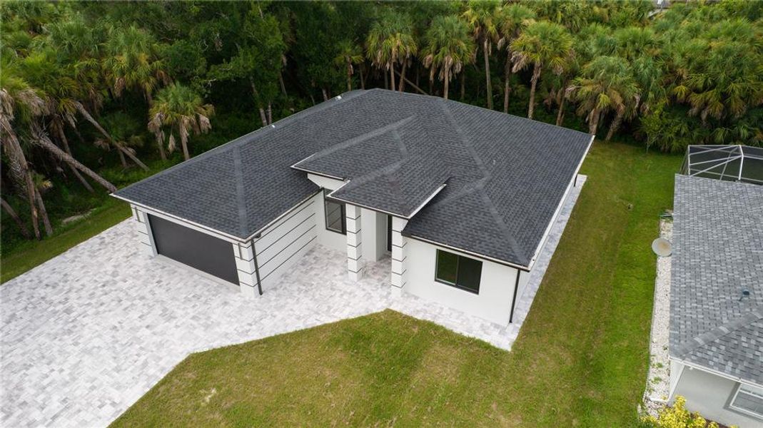 Front exterior of a new home in , North Port, FL, highlighting curb appeal (Image 33).