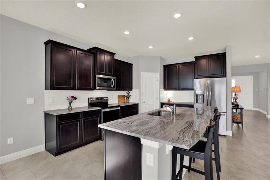 Furnished interior view inside a new home in Woodcreek, Wesley Chapel (Image 16).
