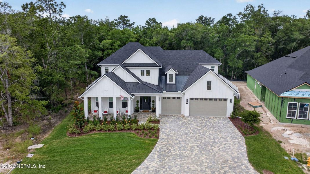 Front exterior of a new home in SilverLeaf, St. Augustine, FL, highlighting curb appeal (Image 22).