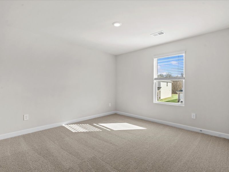 Spacious, unfurnished interior of a new home in The Farm at Wells Creek - Signature Collection, Gray Court (Image 20).