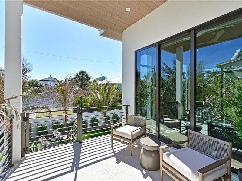 Exterior details and patio area of a home in , Anna Maria (Image 27).
