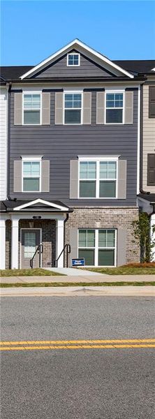Front exterior of a new home in Nickel Creek at Newnan Crossing, Newnan, GA, highlighting curb appeal (Image 21). Front exterior of a new home in Nickel Creek at Newnan Crossing, Newnan, GA, highlighting curb appeal (Image 21).