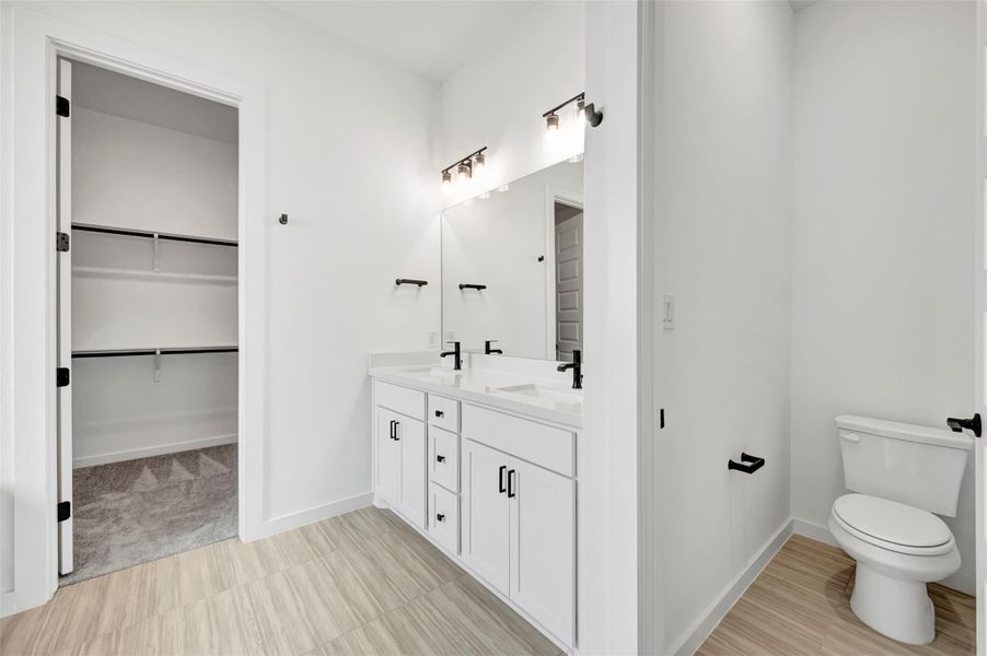 Furnished interior view inside a new home in Heritage, Dripping Springs (Image 15).