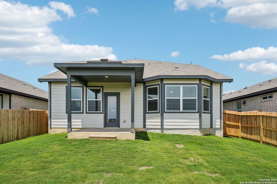 Front exterior of a new home in Sagebrooke - Premier Series, San Antonio, TX, highlighting curb appeal (Image 25). Front exterior of a new home in Sagebrooke - Premier Series, San Antonio, TX, highlighting curb appeal (Image 25).