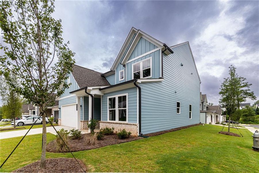 Front exterior of a new home in Enclave at Edgewater, Canton, GA, highlighting curb appeal (Image 31).