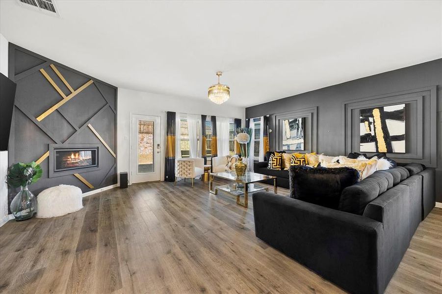 Gorgeous family room opens onto covered patio