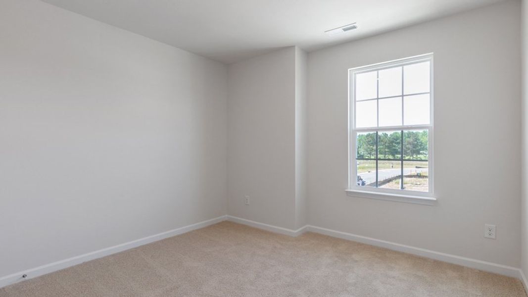 Spacious, unfurnished interior of a new home in The Townes at Matthews Landing, Fuquay Varina (Image 19). Spacious, unfurnished interior of a new home in The Townes at Matthews Landing, Fuquay Varina (Image 19).
