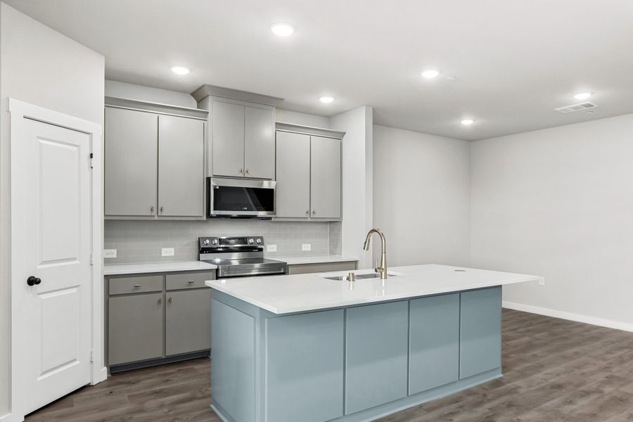 Furnished interior view inside a new home in Wildridge, Oak Point (Image 7).