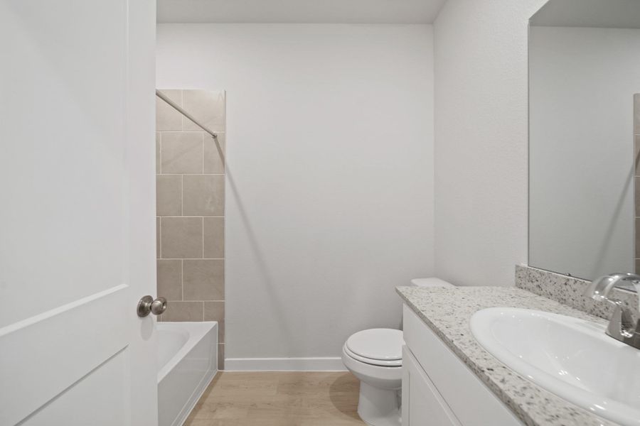 Furnished interior view inside a new home in Riverwood Ranch, Angleton (Image 8).