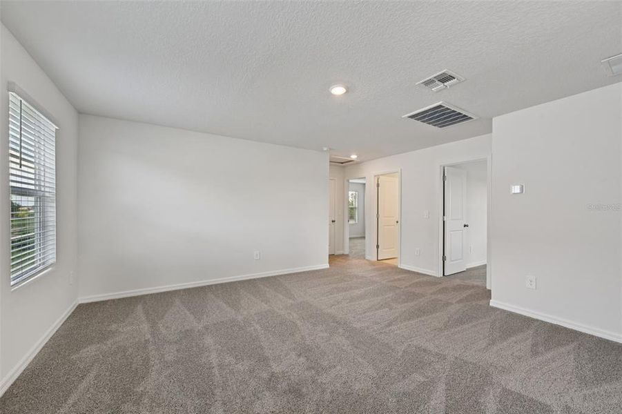 Spacious, unfurnished interior of a new home in Salt Meadows - Premier Series, Parrish (Image 25).